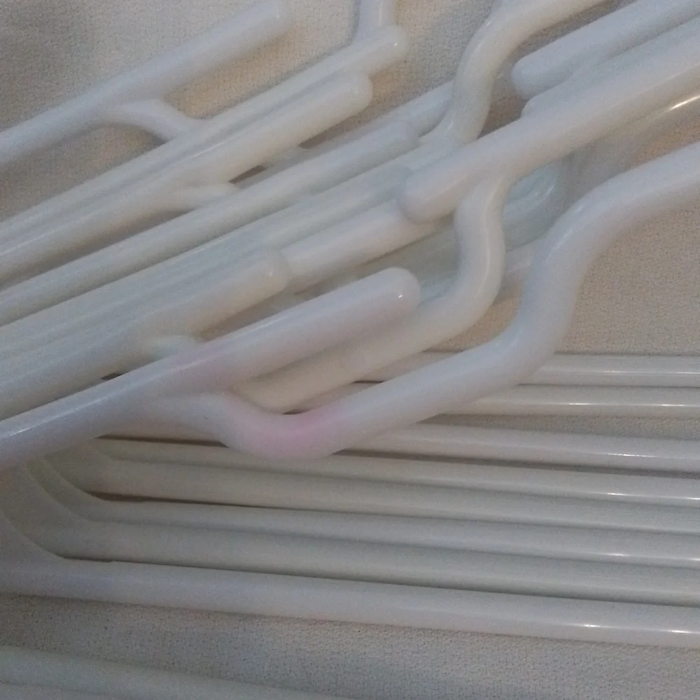 Set of 30 White plastic hangers with hooks